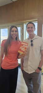 Liz Champion with her book, 'Before Work and at Weekends' with Craig Smith of CRS Editorial.